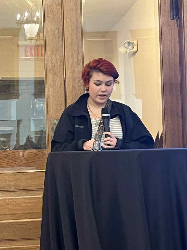 Ali reading her work