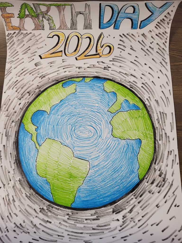 Middle School students celebrating picking up trash and creating posters. They also used the trash to create art! 