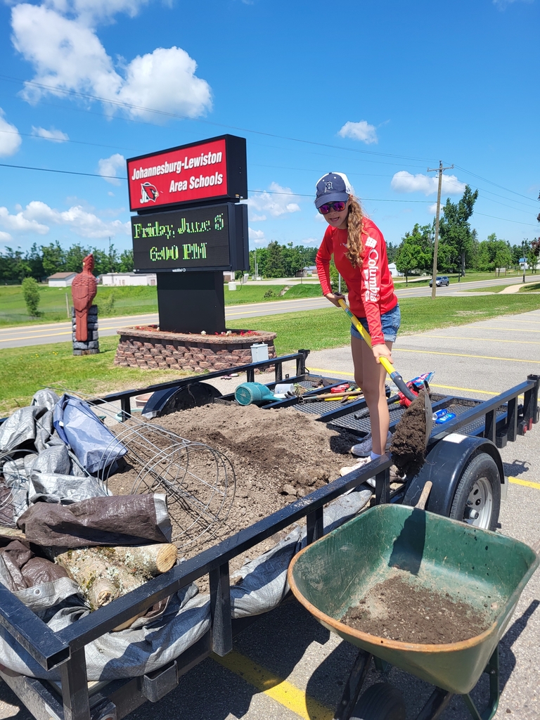 The J-L "Shoe Club" finished up the year with a community service event at the school. We weeded, planted flowers, and mulched around the sign and flag pole!