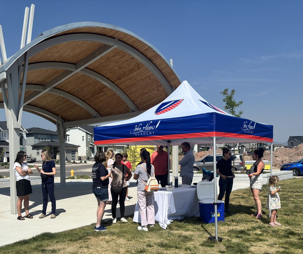 JAA families and faculty meeting at the park.