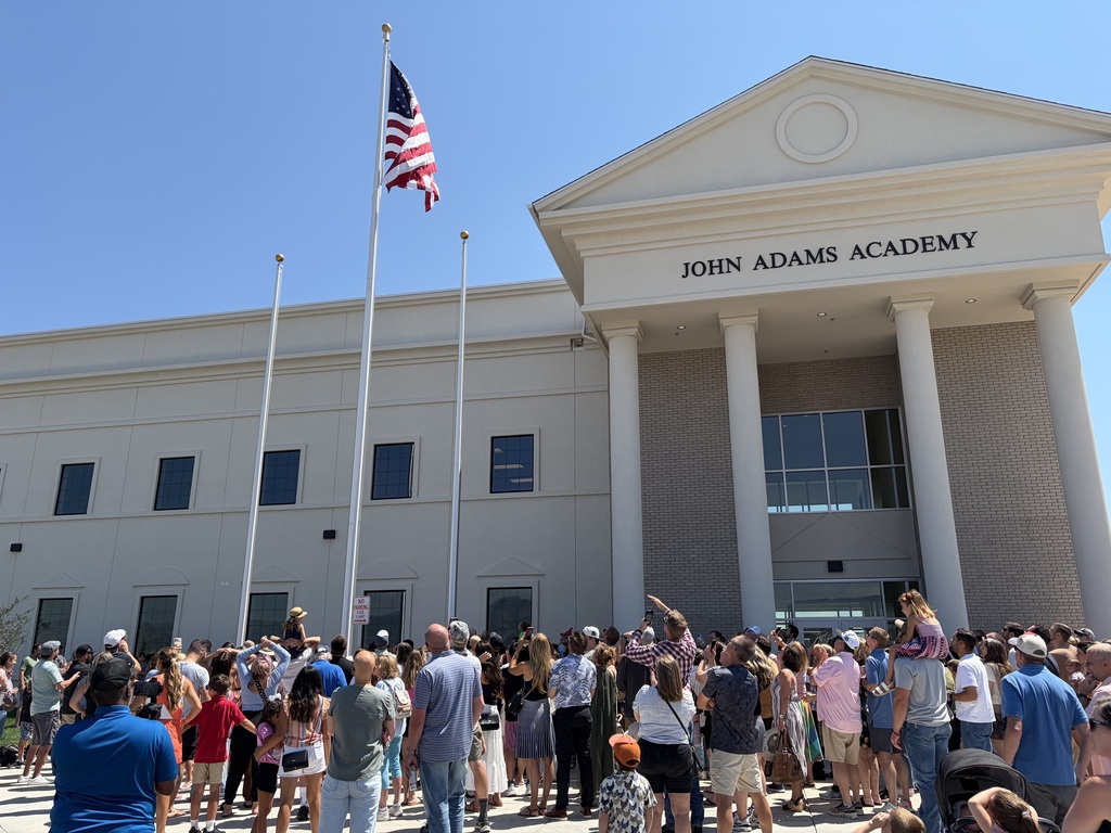 Raising the flag after ribbon cutting
