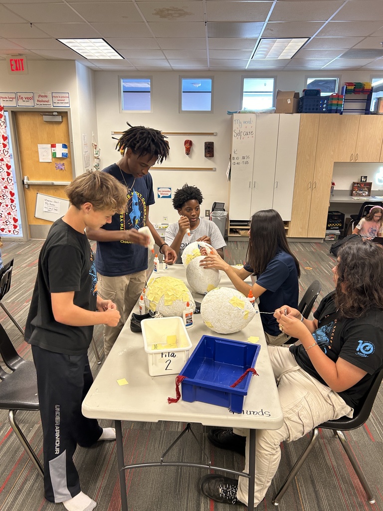 Students create pinatas in Spanish class