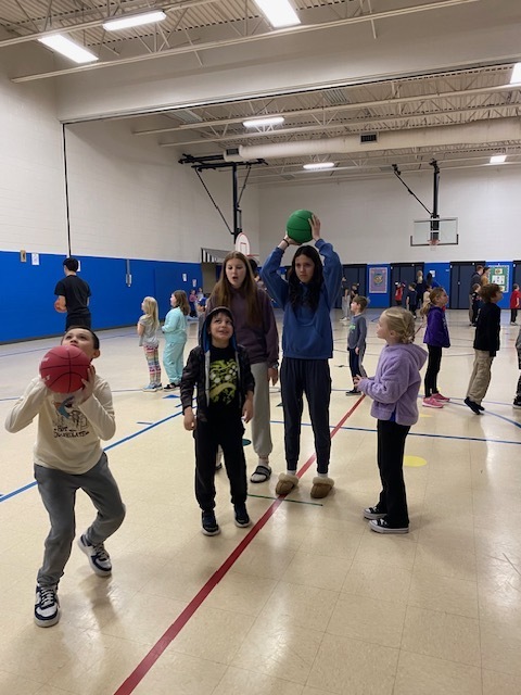 Ringwood students playing basketball with JHS Students