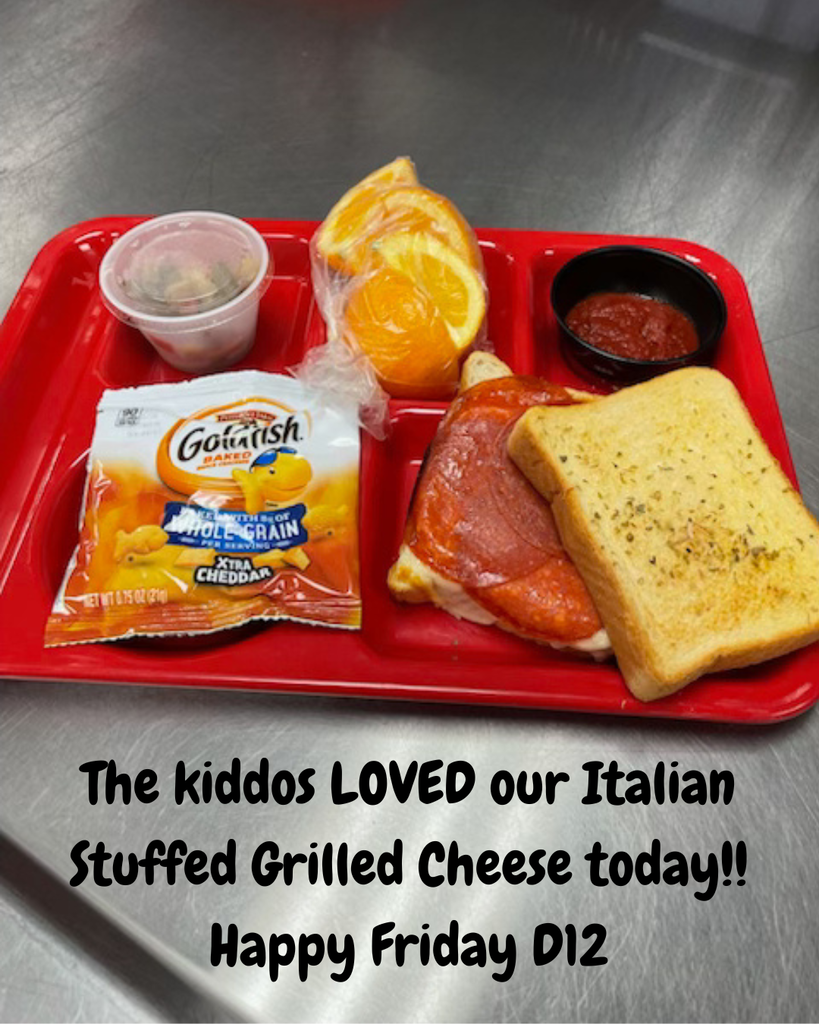 A red tray holds a grilled cheese sandwich, orange slices, and a packet of crackers with a message at the bottom.