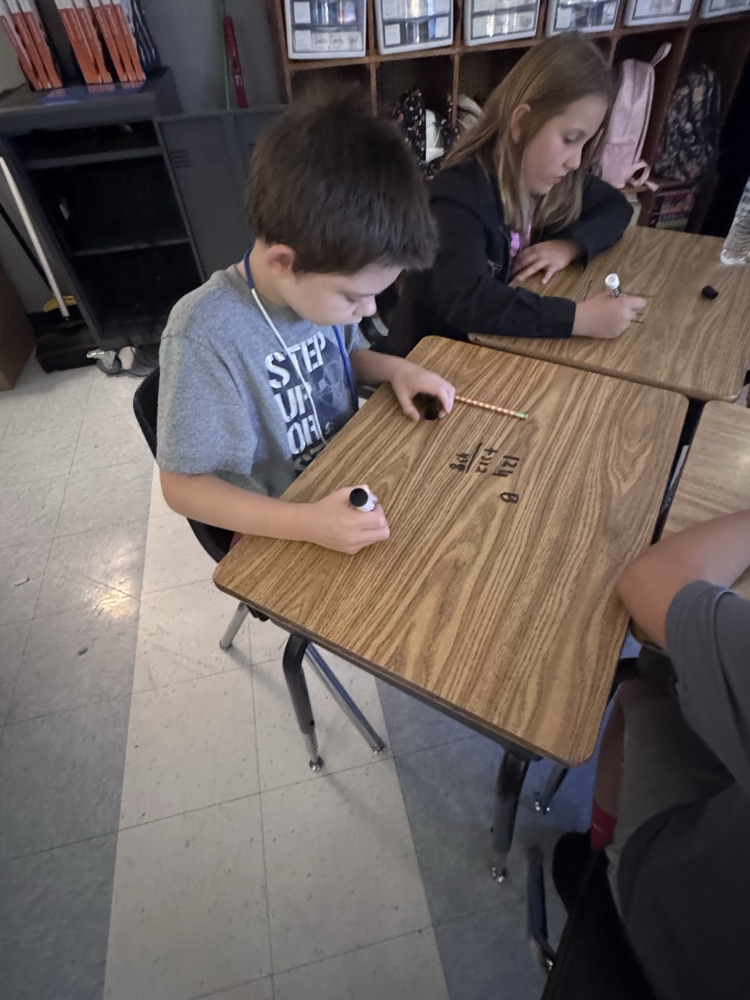 writing on the desks 