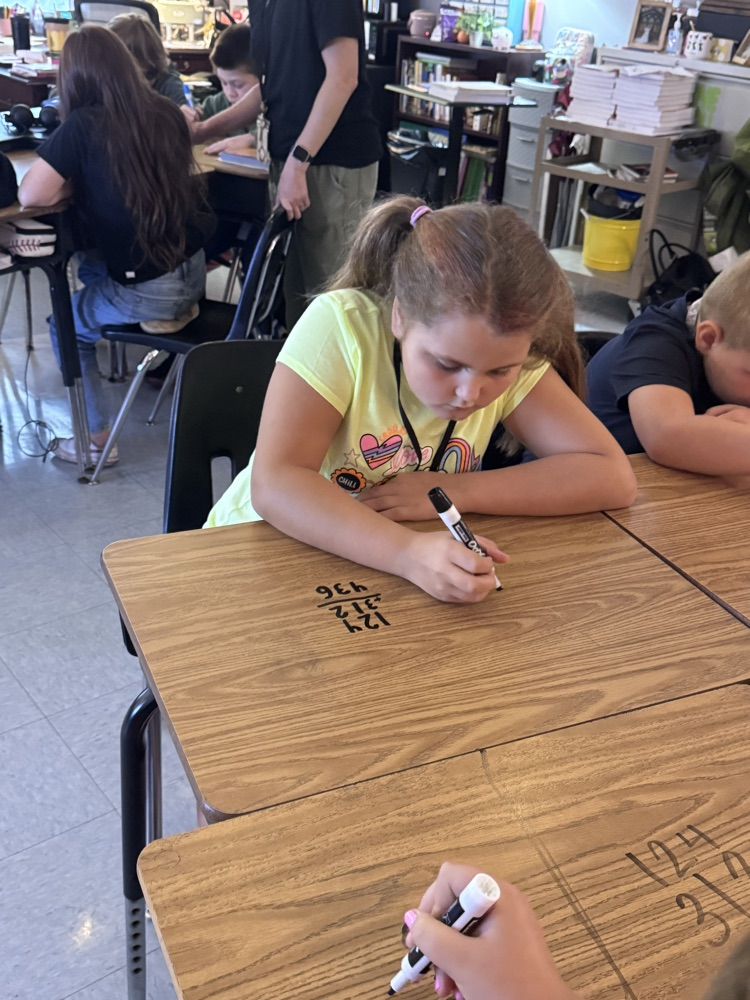writing on the desks 