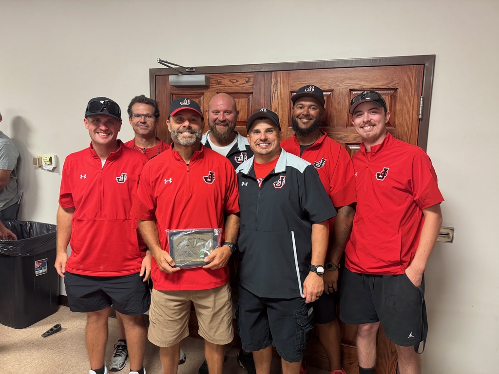 Todd Thomas receives Coach of the Year award