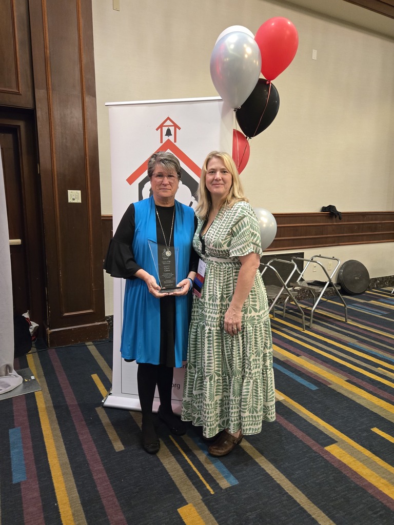 Cheri Litton receive award 