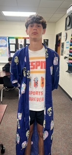 Student modeling kimono for geography class