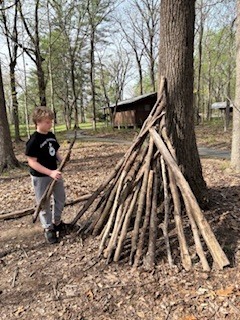student working on his shelter