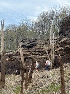 students learning on their hike