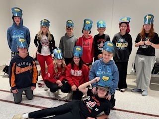Student council members pose in the train station