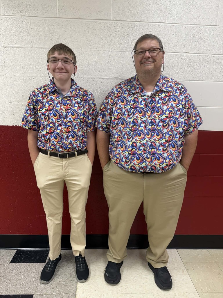 Mr Dobraski and son, wearing matching outfits