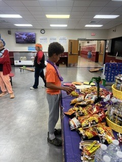 staff and families celebrate alop family night