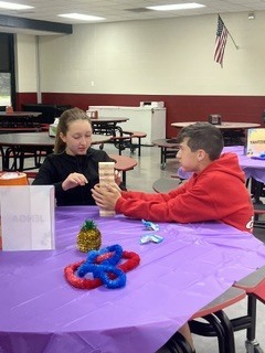staff and families celebrate alop family night