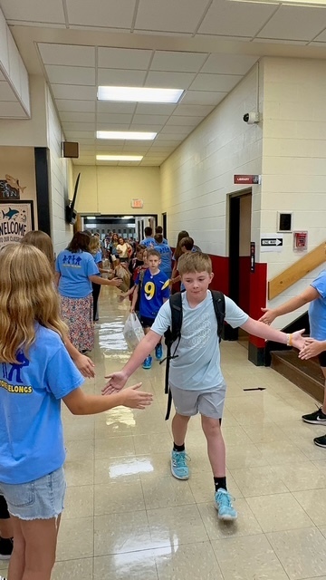 WEB leaders guide 5th grade students on their first day
