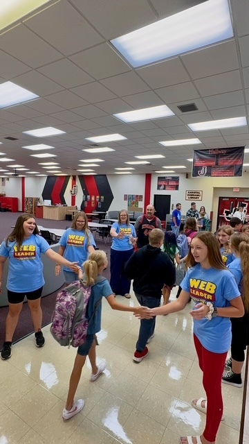 WEB leaders guide 5th grade students on their first day