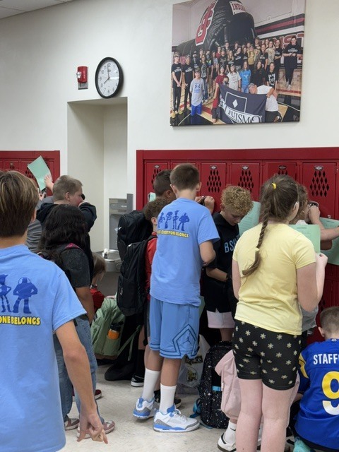 WEB leaders guide 5th grade students on their first day