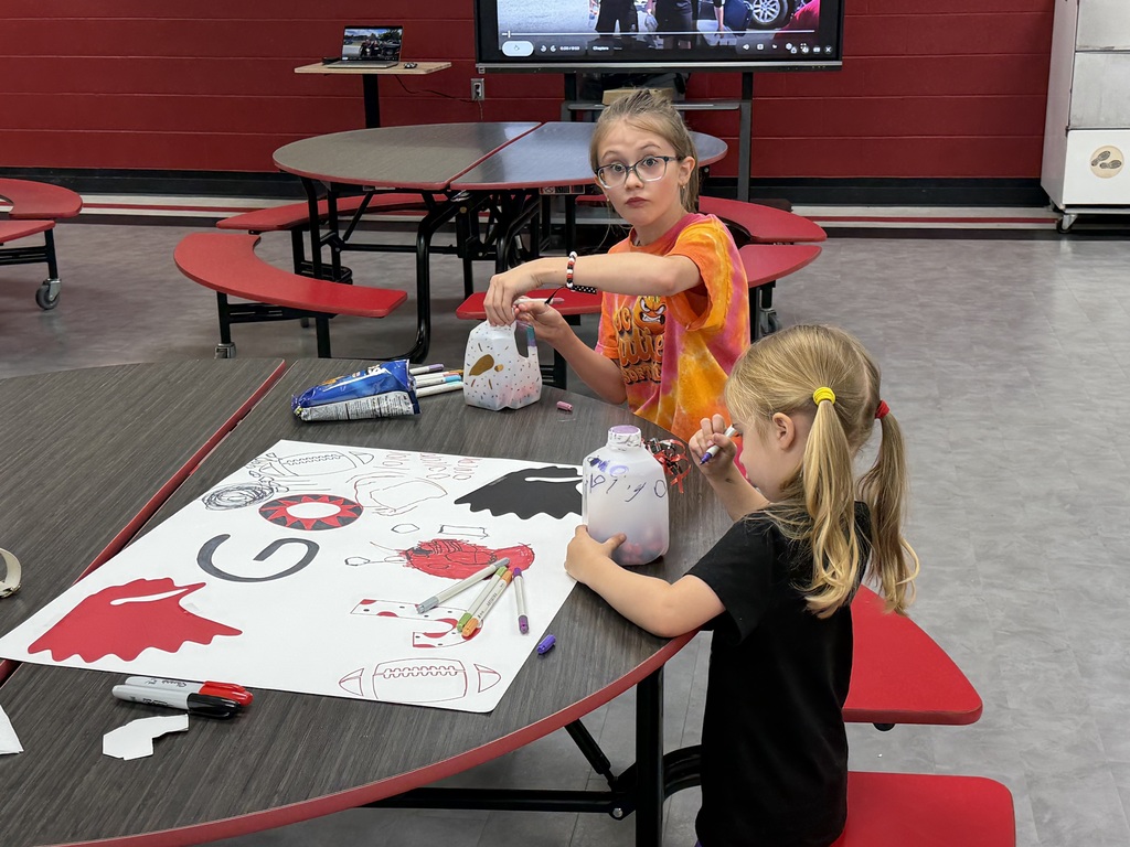 families make spirit shakers on family night