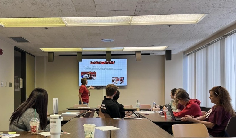 Walker giving presentation at SIU