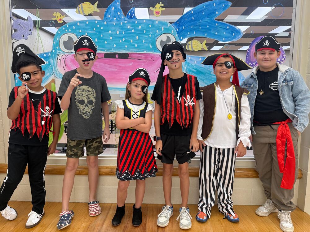 image of students dressed up for talk like a pirate day
