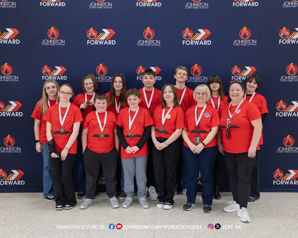 Picture of the njms battle of the books team and coaches 