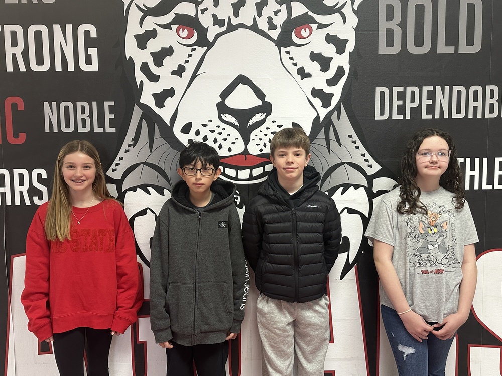 picture of 4 6th graders 