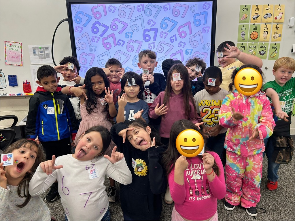 Group of first graders in front of smart board