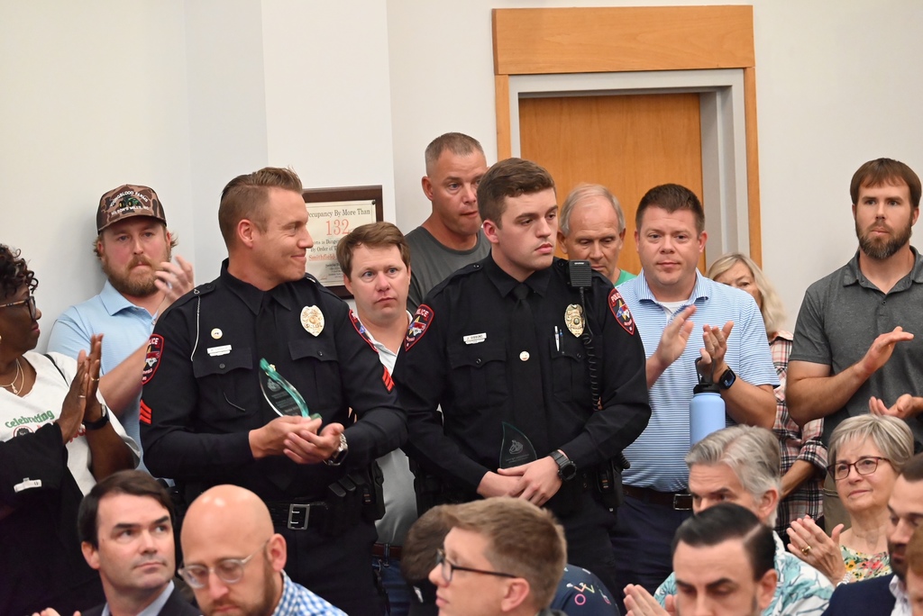 Officer Parrish and Officer Gibbons receiving awards