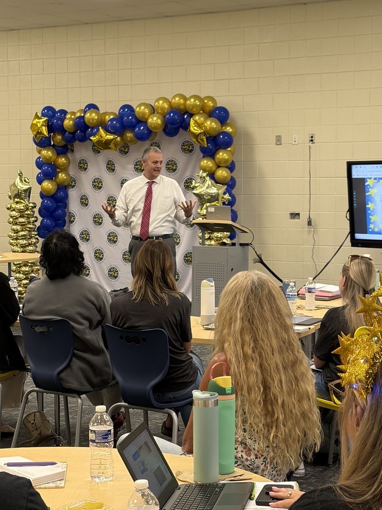 Dr. Pearce speaking to staff