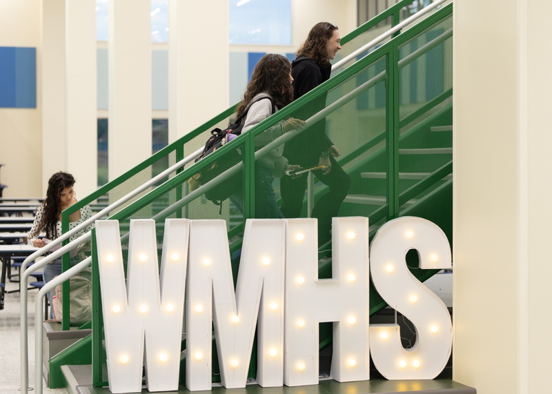 The Wilson’s Mills High letters shine brightly as students climb the stairs to their class.
