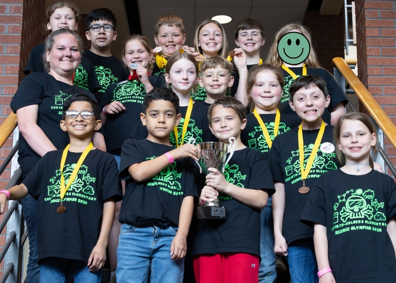 Corinth-Holders Elementary stands with their trophy.