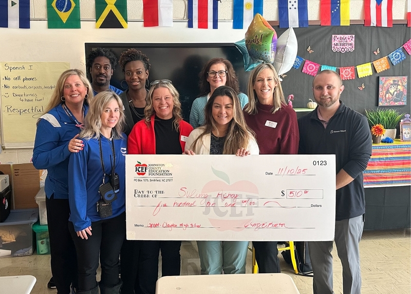 Suling Achoy receives grant check