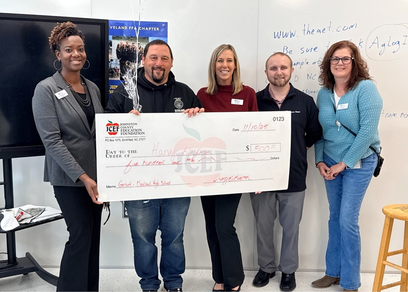 Harvey Blackman receives grant check