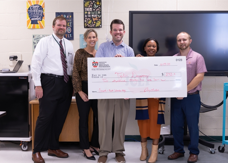 Tyler Daughtry receives grant check