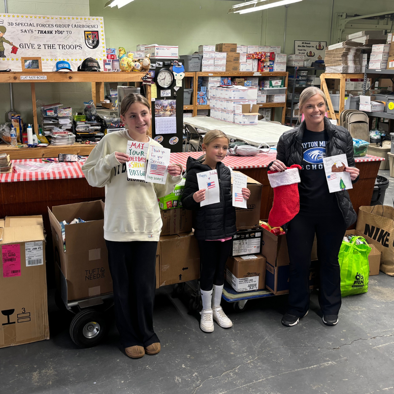 Mrs. Fitzgerald and family drop off donations to Packs4Patriots
