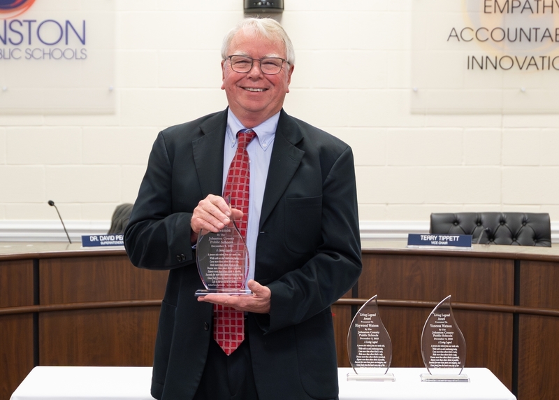 Keith Beamon stands with his Living Legend Award.