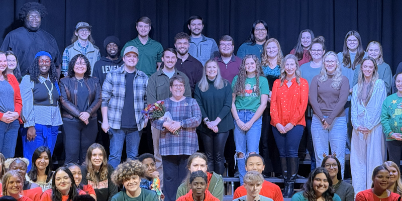 Mrs. Mooring and her chorus students