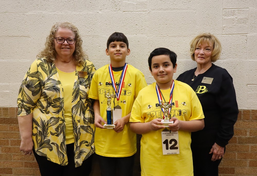 Superintendent and School Board Member with Elementary Spelling Bee Winner and Runner Up