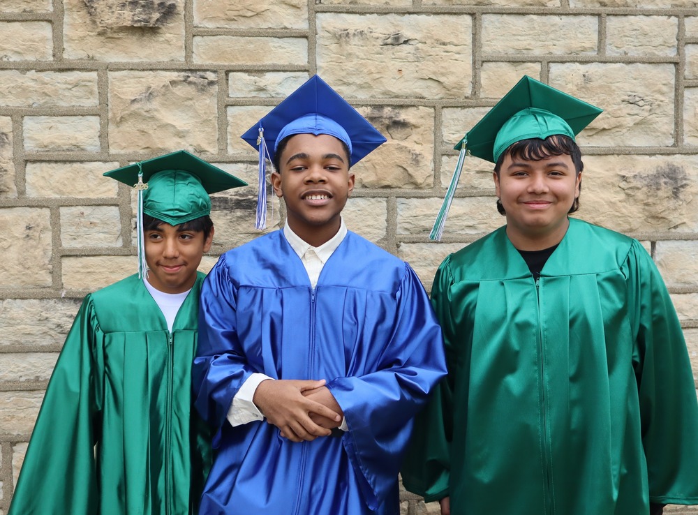 Two Gompers and one Hufford eighth grade graduate