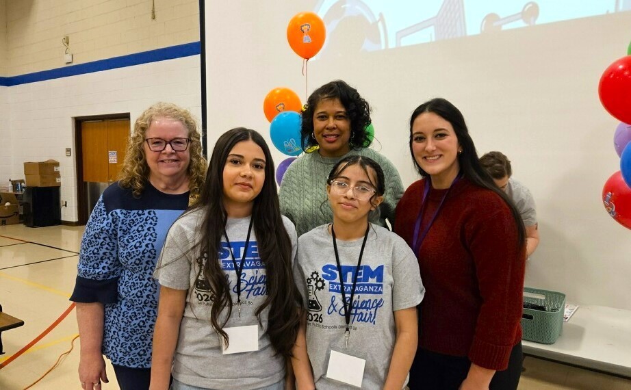 Two Dirksen students with Superintendent and Assistant Superintendent at STEM Fair