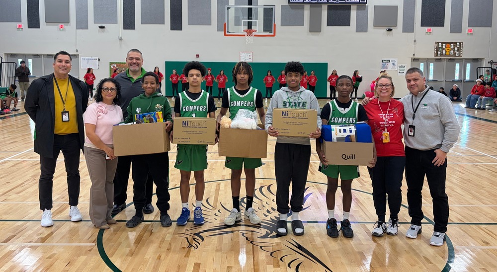 Gompers students and staff with Guardian Angel Community Services Staff