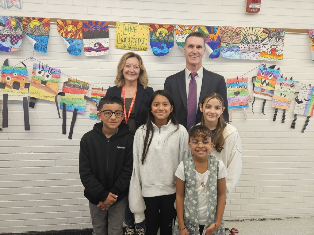 Picture of honorary principal with Forest Park principal and students