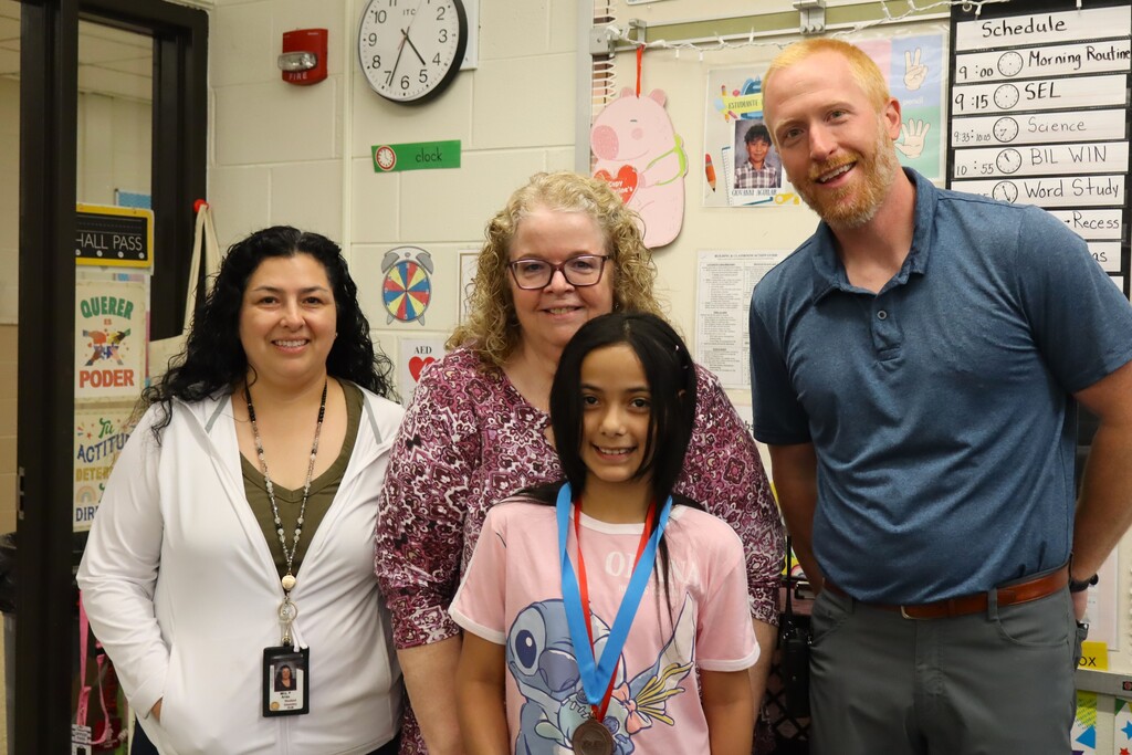 Woodland Superintendent Award Student Winner with Superintendent, Teacher, and Principal