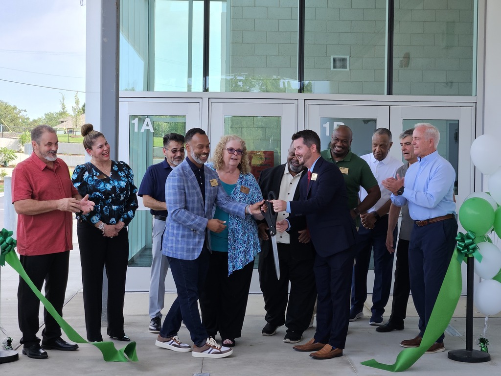 Ribbon cutting picture at Gompers