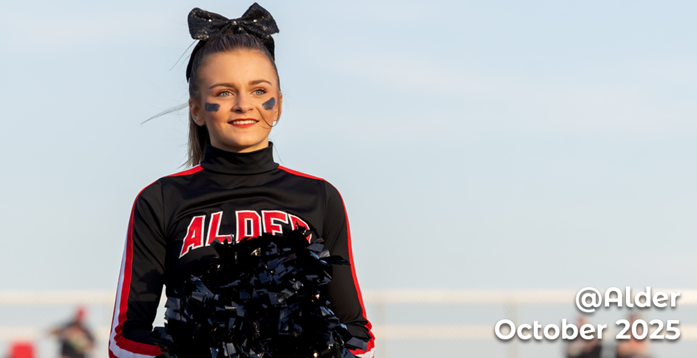 jr high cheerleader smiling