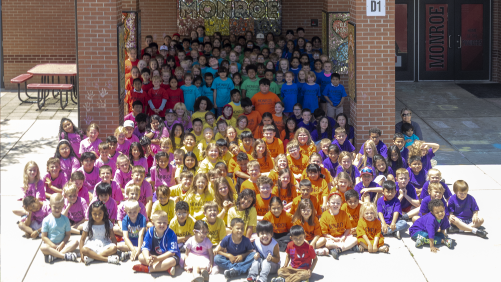 MES students in front of building