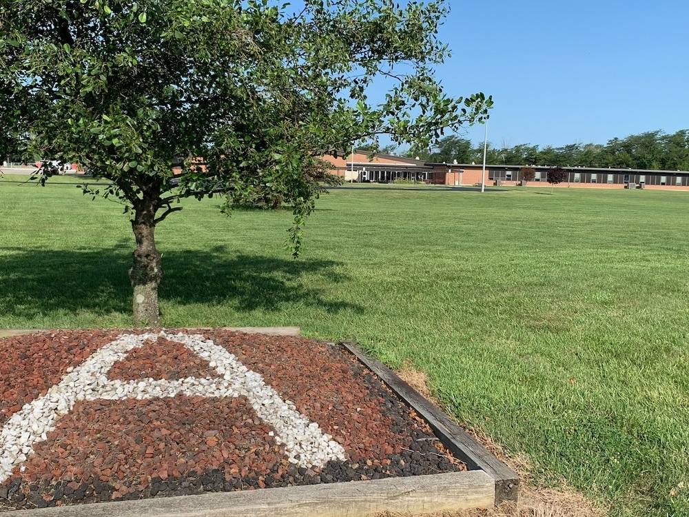 Logo in front of school