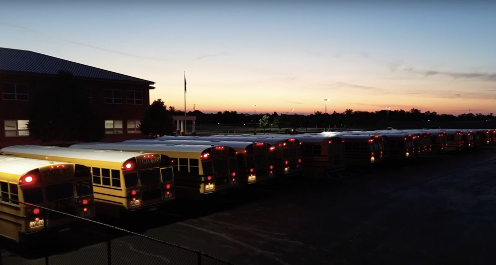 JA Buses with sunrise