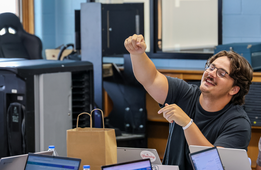 Staff member smiling